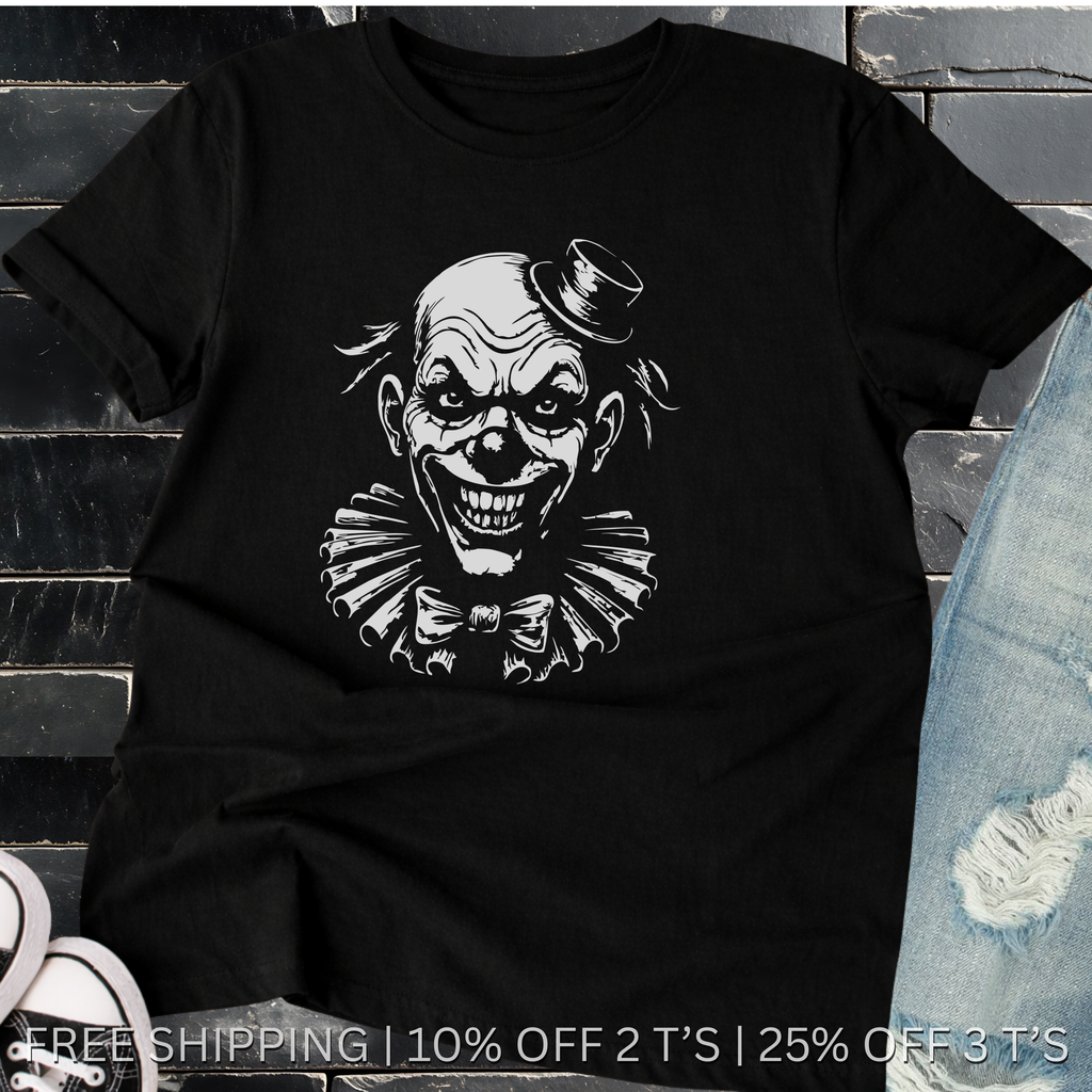 Black t-shirt with a graphic of a clown's face on a stone surface.