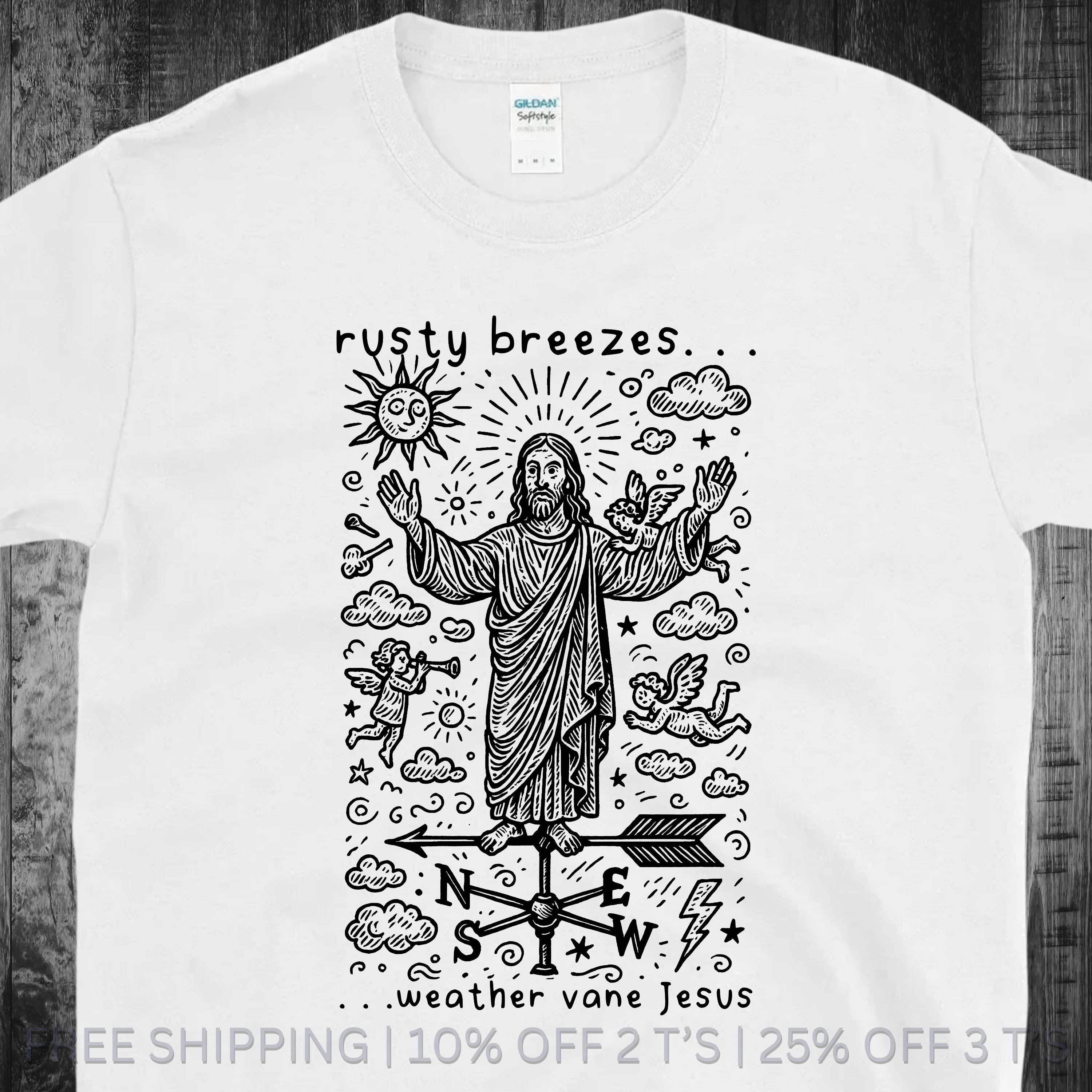 White t-shirt with black graphic design featuring a figure and text on a wooden surface