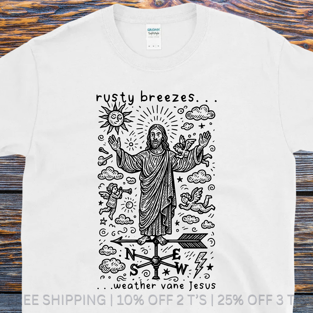 White t-shirt with black graphic design featuring a figure and text on a wooden surface
