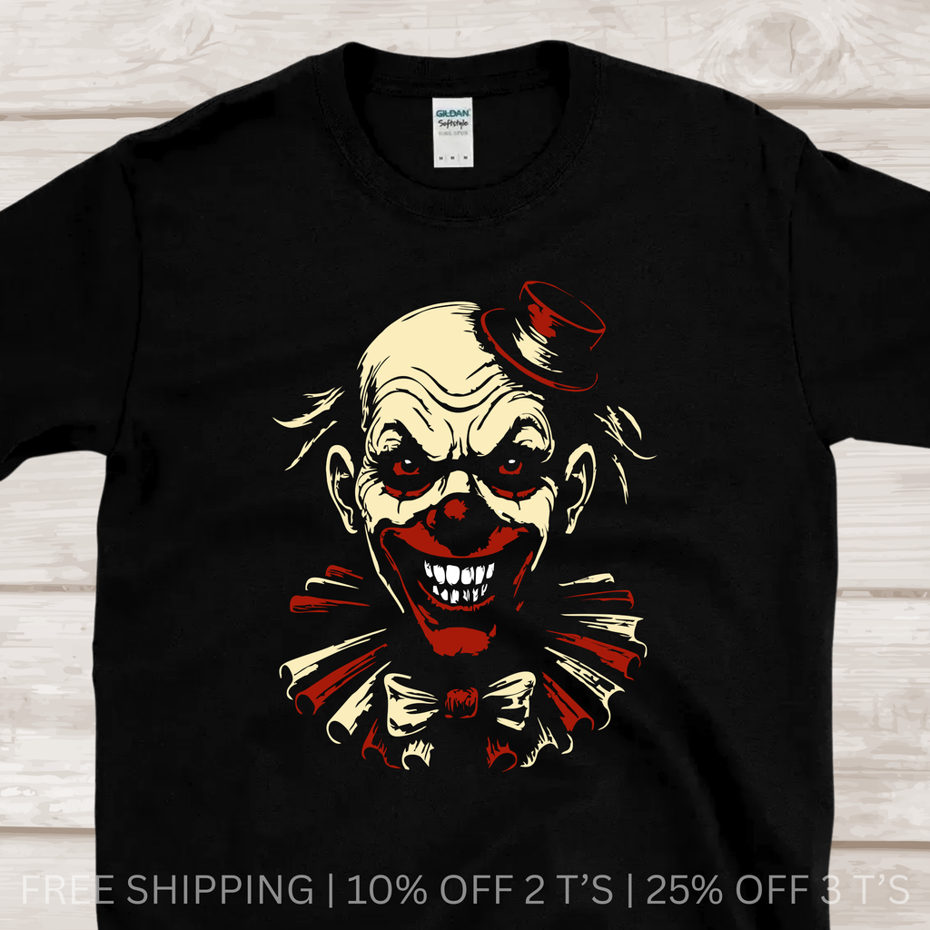 Black clown horror graphic T-shirt featuring sinister clown face red accents and dark streetwear art