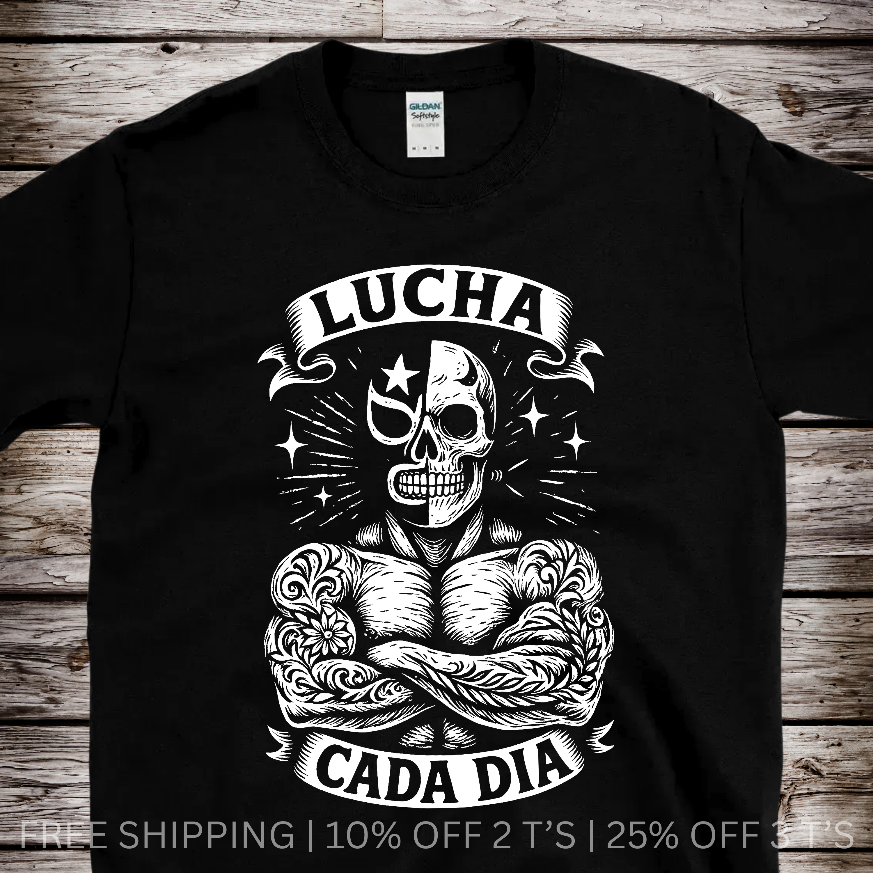 Black and white skull graphic T-shirt featuring Lucha Cada Día text and lucha mask art